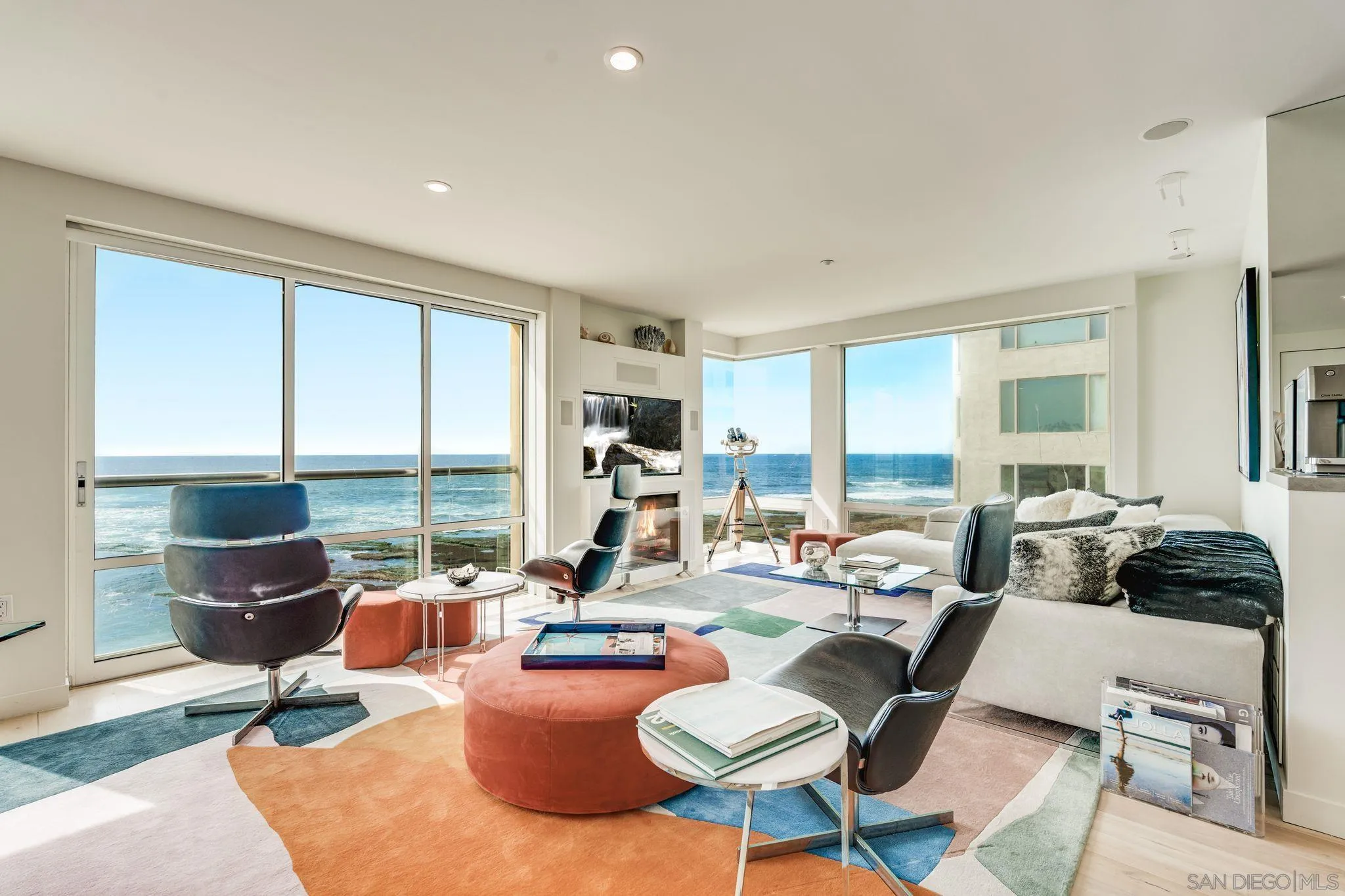 202 Coast Boulevard, Unit 6 La Jolla, CA 92037 - Photo 7 of 22 a living room with furniture and a large window