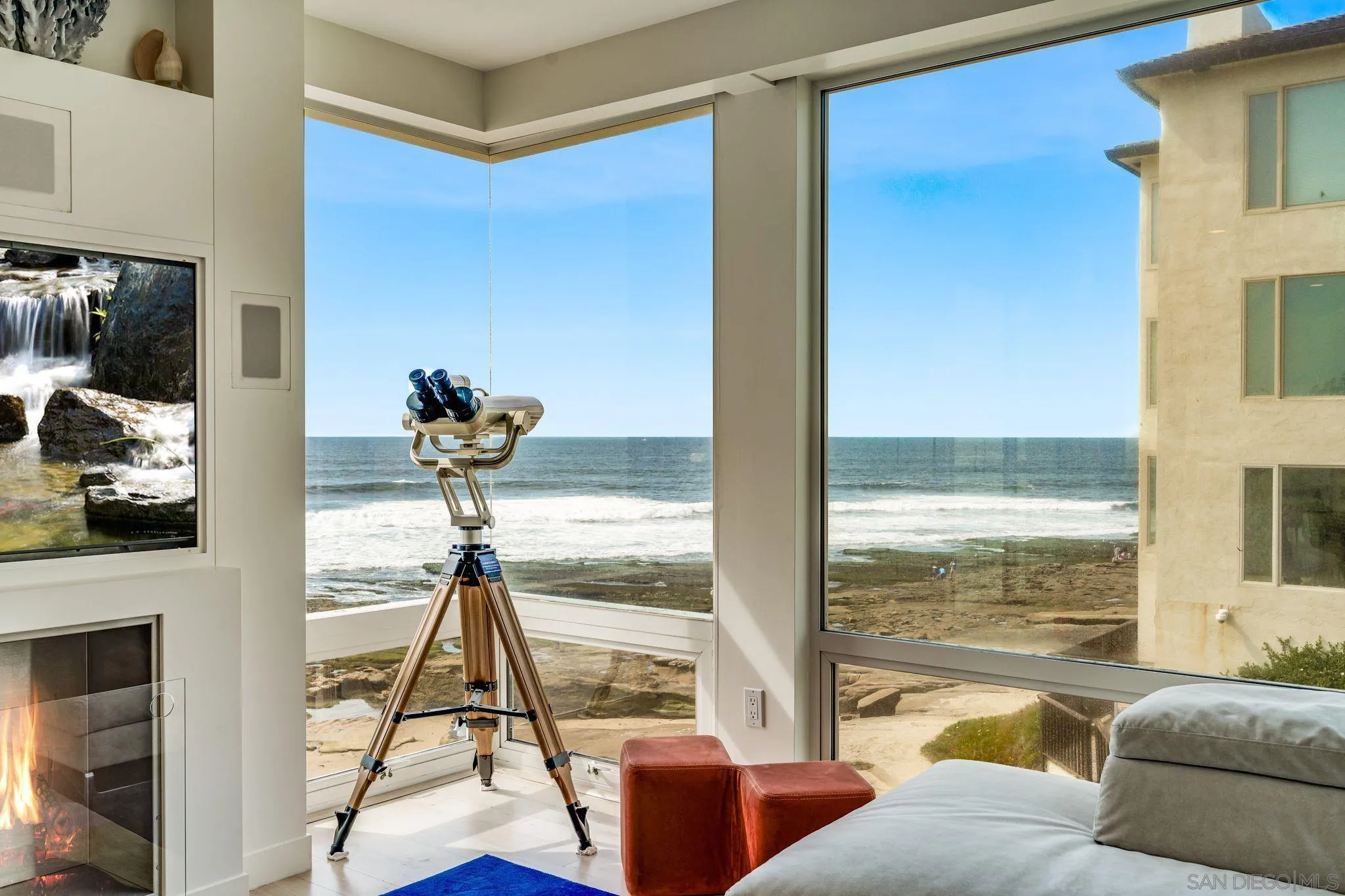 202 Coast Boulevard, Unit 6 La Jolla, CA 92037 - Photo 9 of 22 a living room with furniture and a floor to ceiling window