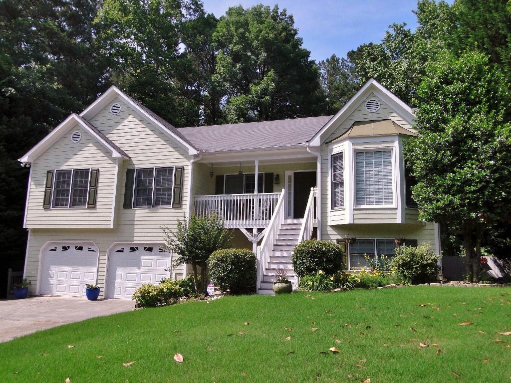 5240 Proctor Lndg Road Acworth, GA 30101 - Photo 1 of 1 Front of house has great curb appeal!