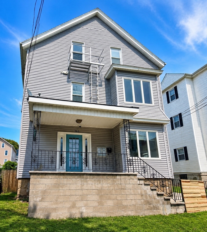 280 Ridge Street Fall River, MA 02721 - Photo 1 of 7 a front view of a house with a yard