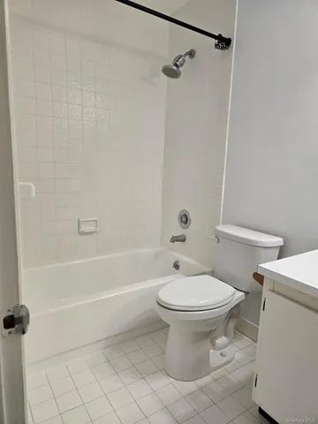 a bathroom with a toilet a sink and a bathtub