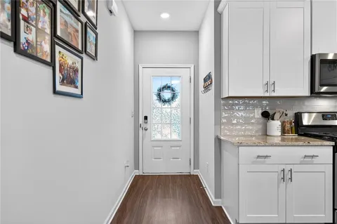 a view of cabinets with wooden floor and cabinets
