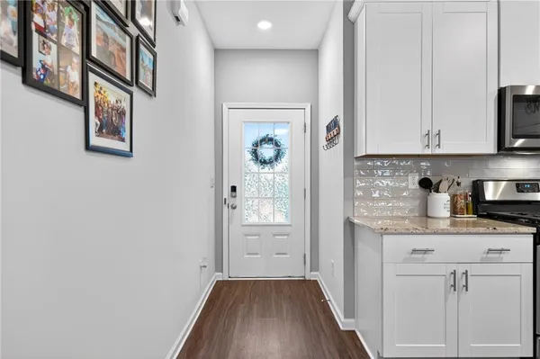 a view of cabinets with wooden floor and cabinets