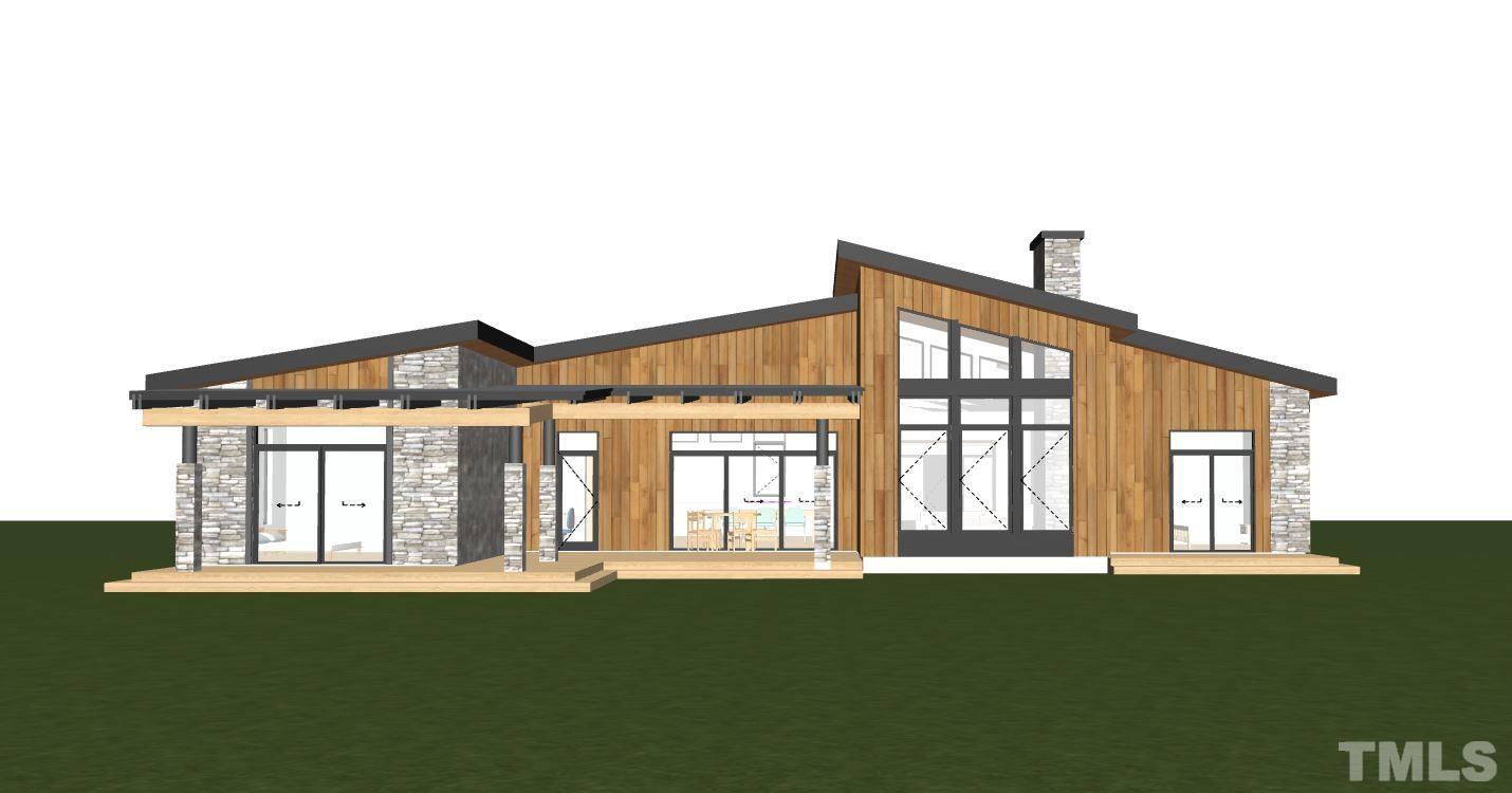 7 Array Drive Hillsborough, NC 27278 - Photo 2 of 9 a front view of a house with garden