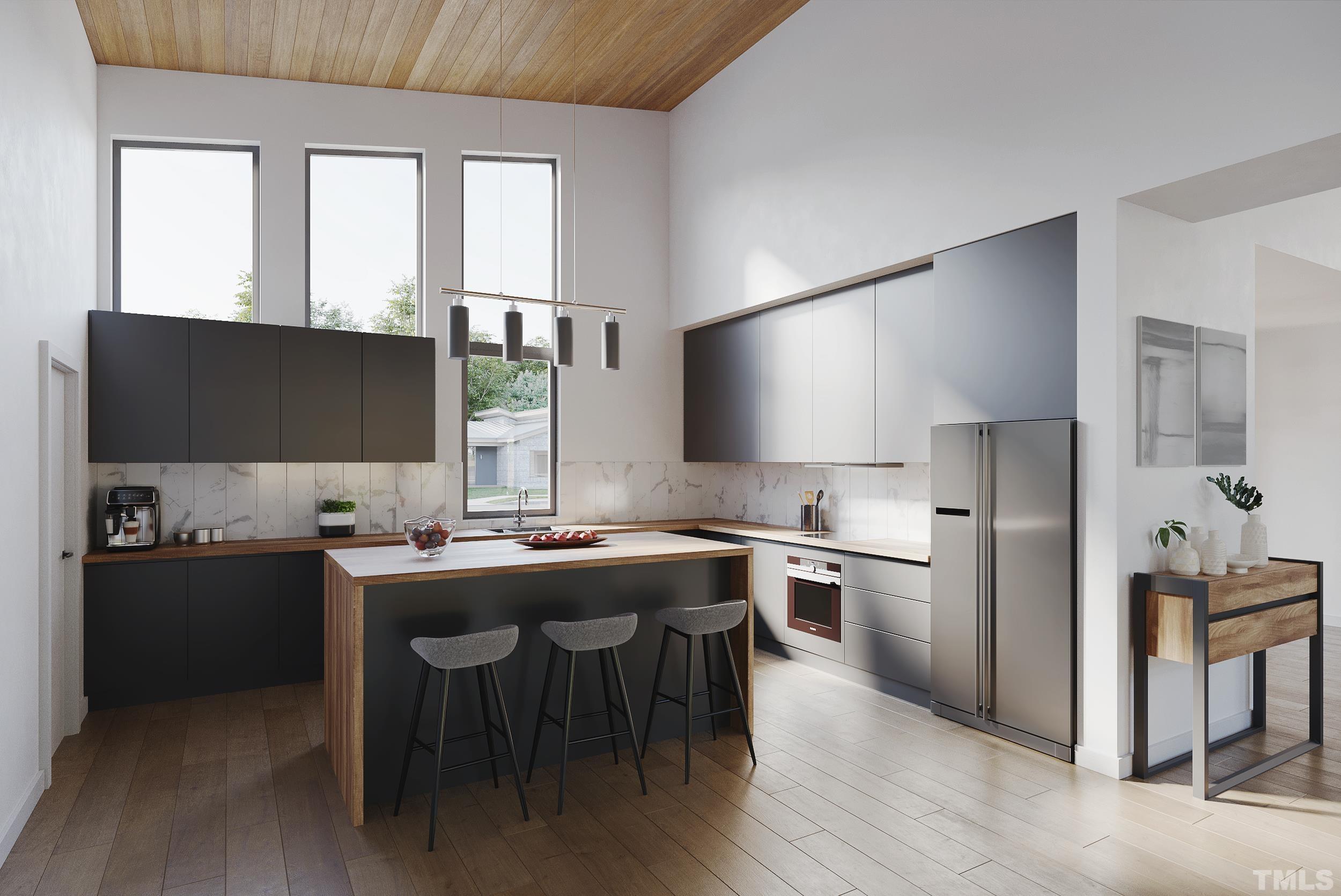 7 Array Drive Hillsborough, NC 27278 - Photo 5 of 9 a kitchen with stainless steel appliances granite countertop a sink stove and refrigerator