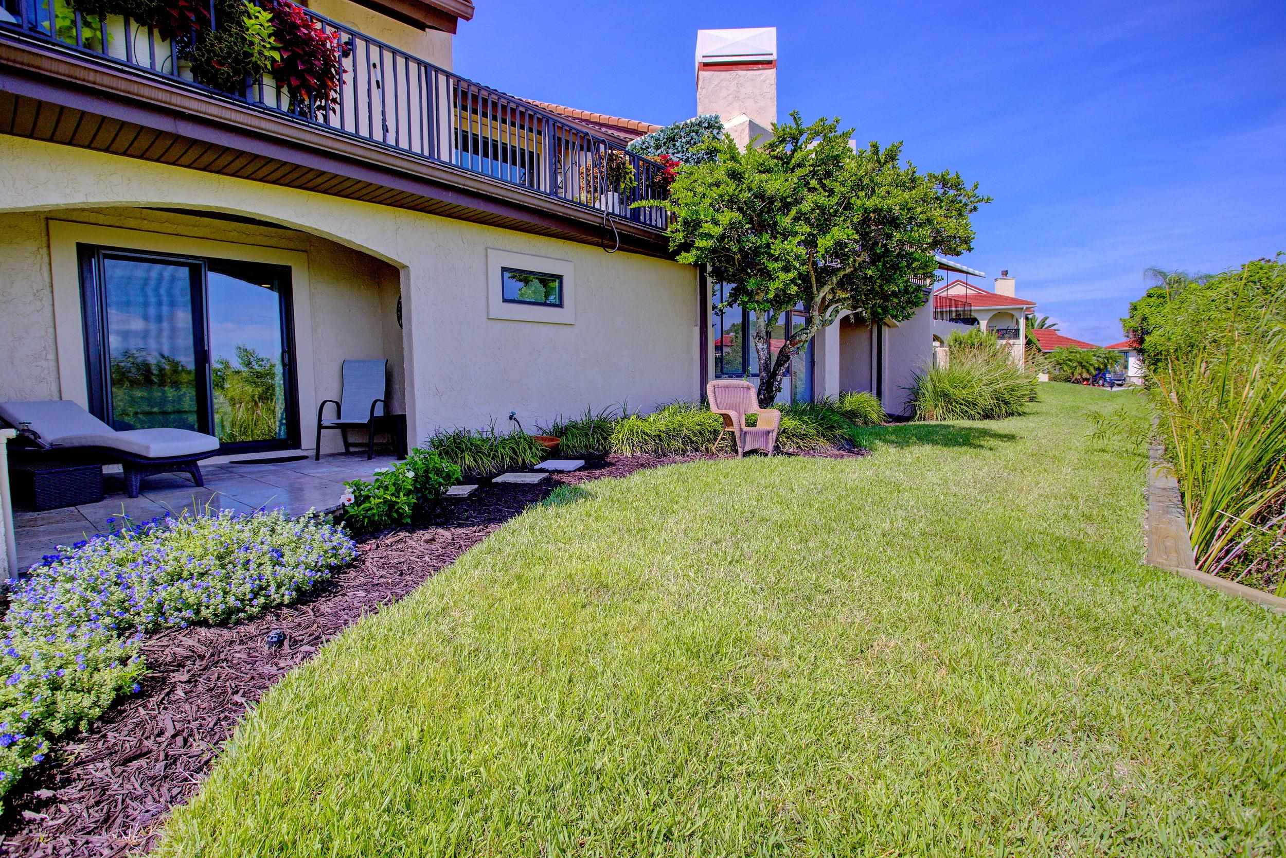 3431 Harbor Drive St. Augustine, FL 32084 - Photo 49 of 61 a front view of a house with a yard