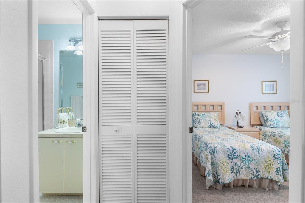 25100 Sandhill Boulevard, Unit R202 Punta Gorda, FL 33983 - Photo 20 of 39 a bedroom with a bed and a window