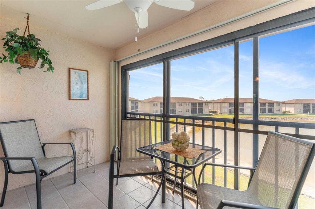 25100 Sandhill Boulevard, Unit R202 Punta Gorda, FL 33983 - Photo 26 of 39 a view of a balcony with chairs
