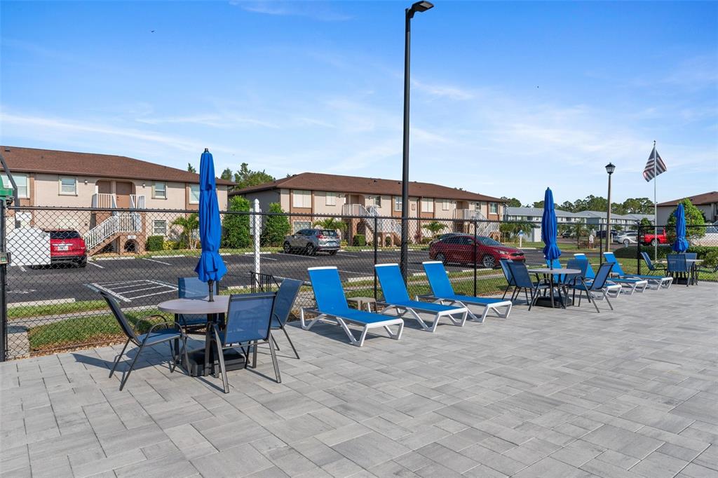 25100 Sandhill Boulevard, Unit R202 Punta Gorda, FL 33983 - Photo 34 of 39 a view of a terrace with sitting area