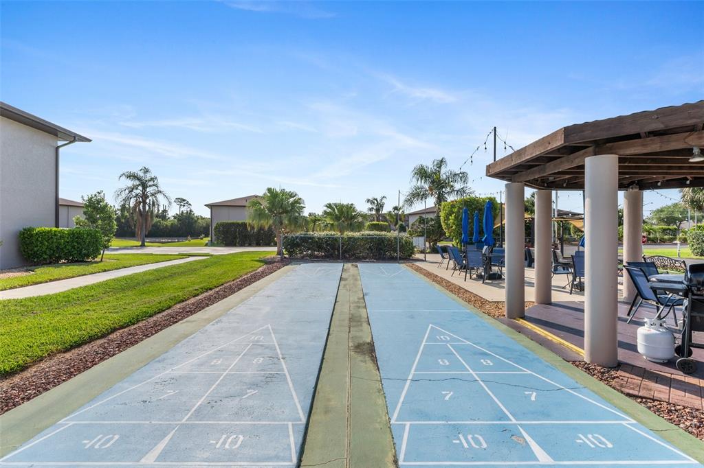25100 Sandhill Boulevard, Unit R202 Punta Gorda, FL 33983 - Photo 38 of 39 a view of swimming pool with a patio
