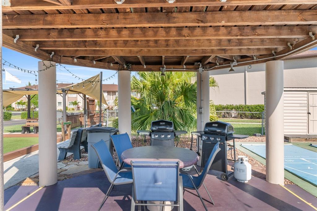 25100 Sandhill Boulevard, Unit R202 Punta Gorda, FL 33983 - Photo 39 of 39 a view of a dining room with furniture window and outside view