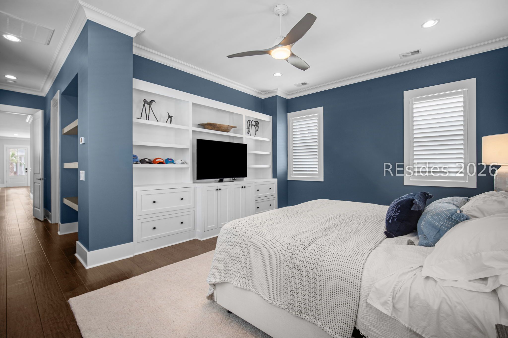 5778 Yaupon Road Bluffton, SC 29910 - Photo 28 of 61 Custom bookshelves in the primary bedroom