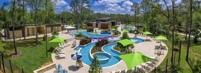 a view of swimming pool with outdoor seating