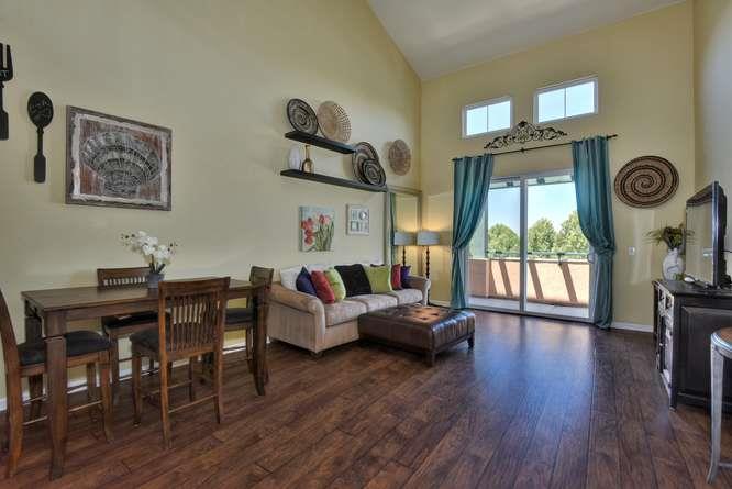 1310 Saddle Rack Street, Unit 438 San Jose, CA 95126 - Photo 3 of 18 a living room with furniture and a large window