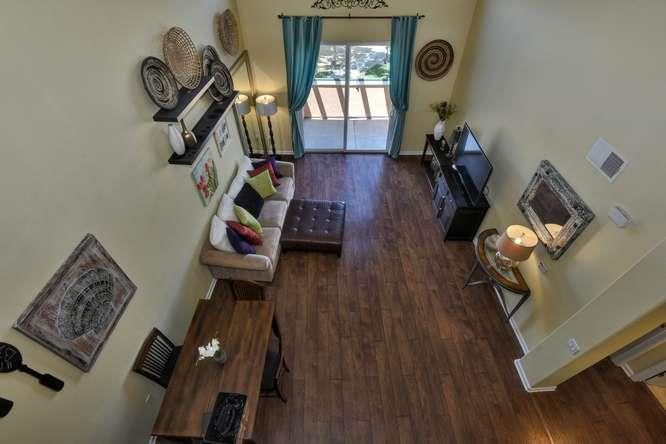 1310 Saddle Rack Street, Unit 438 San Jose, CA 95126 - Photo 4 of 18 a view of entryway with wooden floor
