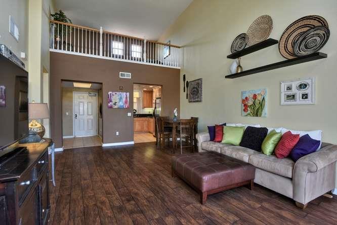 1310 Saddle Rack Street, Unit 438 San Jose, CA 95126 - Photo 5 of 18 a living room with furniture and wooden floor