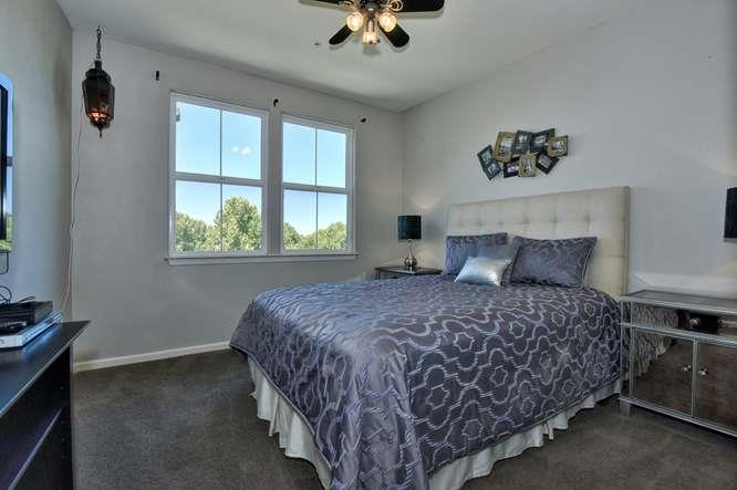 1310 Saddle Rack Street, Unit 438 San Jose, CA 95126 - Photo 8 of 18 a bedroom with a bed and window