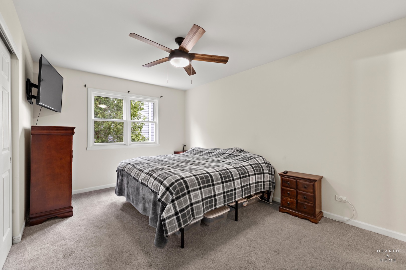 831 Chestnut Court Marengo, IL 60152 - Photo 13 of 29 a bedroom with a bed and a tv