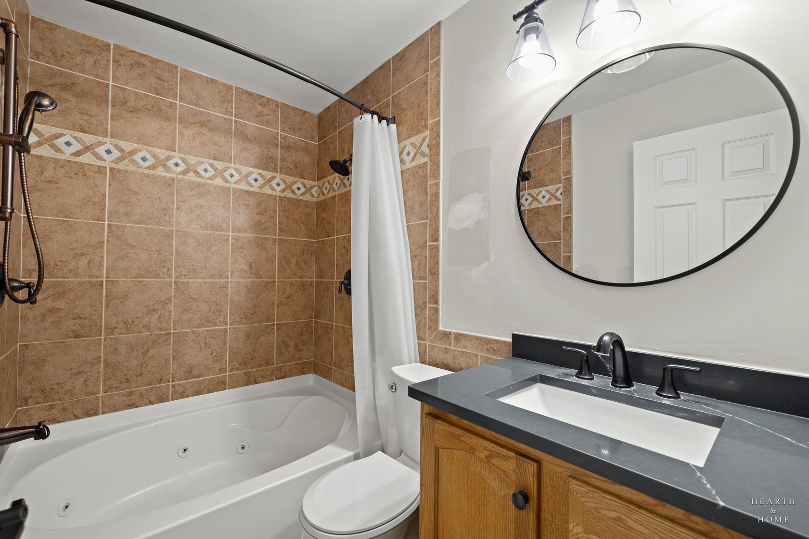 831 Chestnut Court Marengo, IL 60152 - Photo 15 of 29 a bathroom with a sink and a mirror