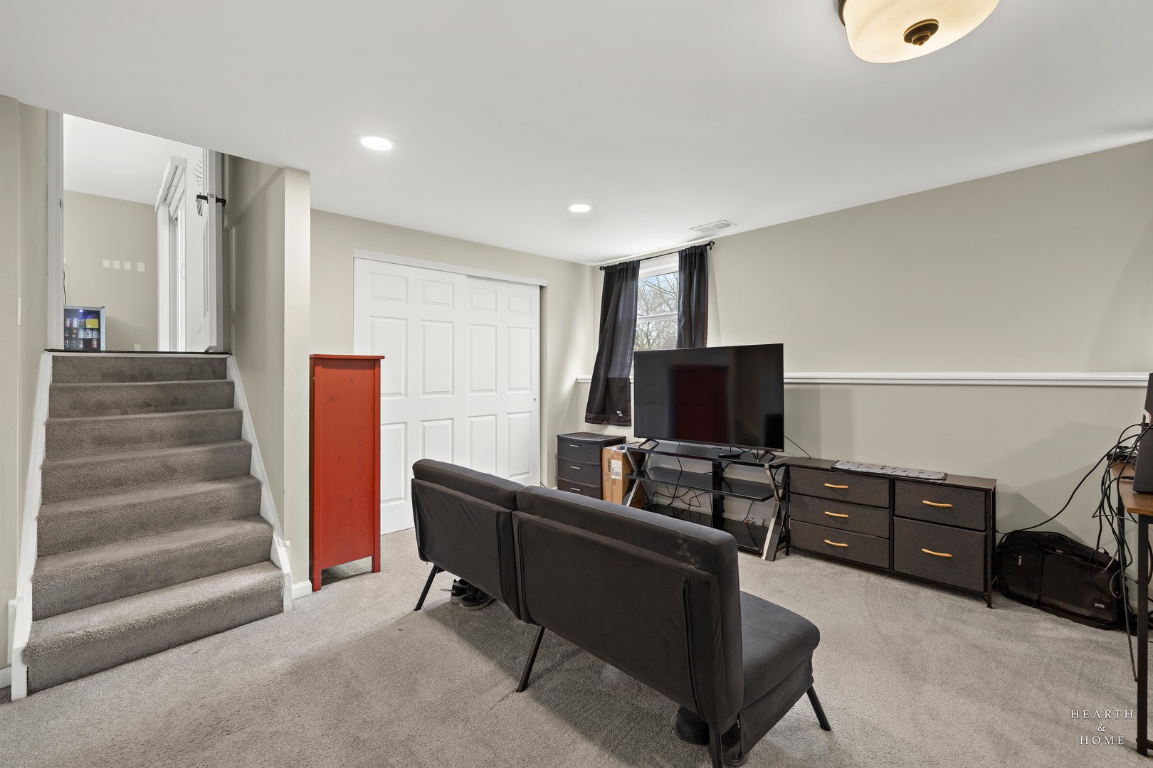 831 Chestnut Court Marengo, IL 60152 - Photo 20 of 29 a living room with furniture and a flat screen tv