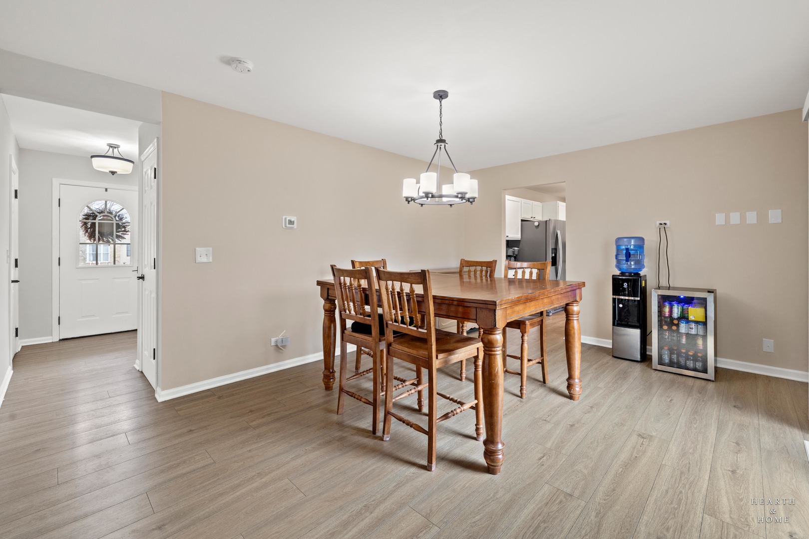 831 Chestnut Court Marengo, IL 60152 - Photo 5 of 29 a view of a dining room with furniture and wooden floor