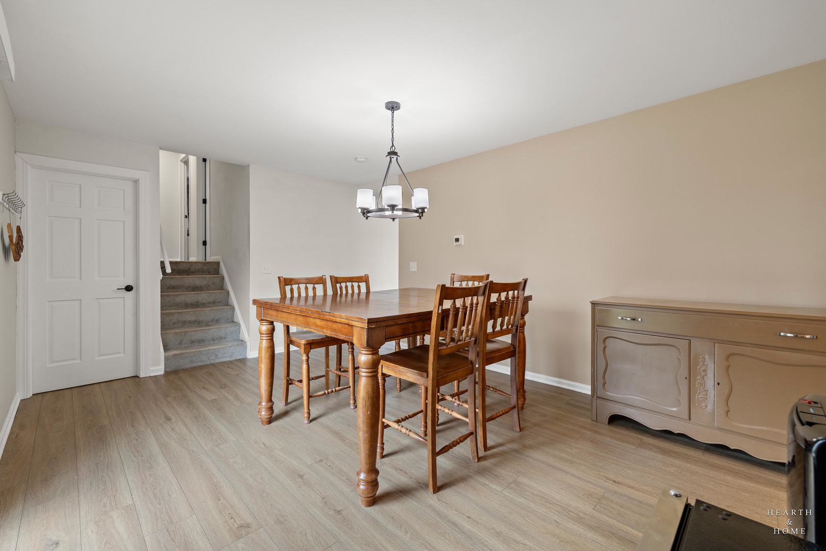 831 Chestnut Court Marengo, IL 60152 - Photo 7 of 29 a dining room with furniture and wooden floor