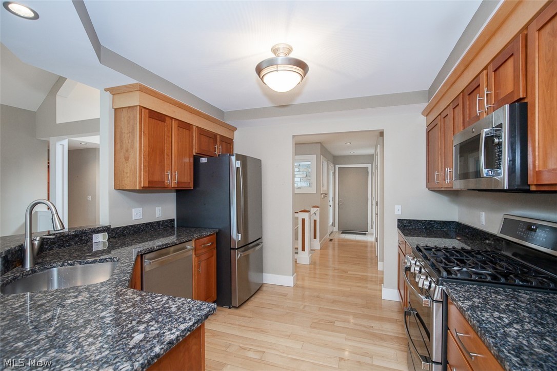7282 Holzhauer Road Northfield, OH 44067 - Photo 11 of 47 Kitchen with natural cherry cabinets