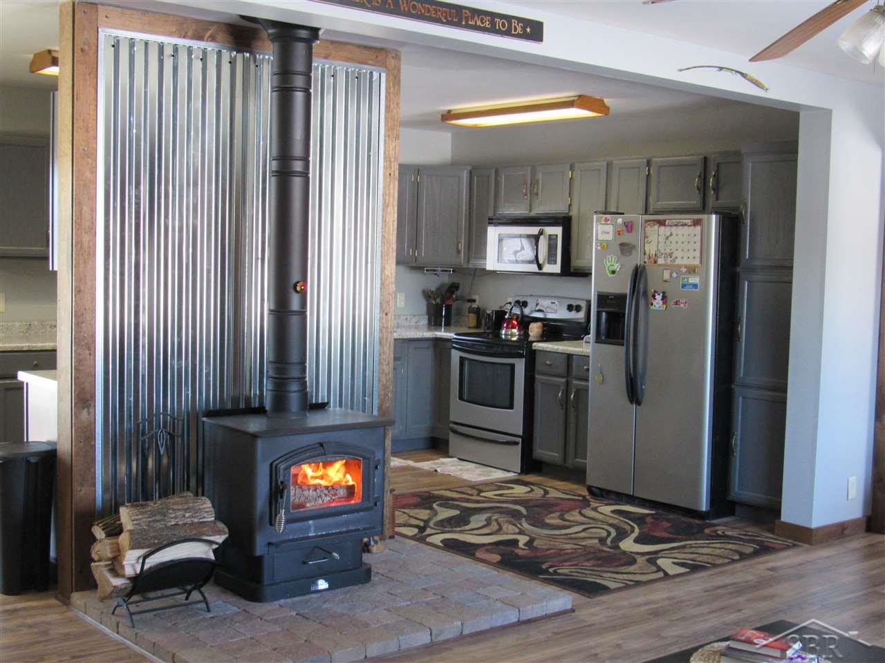 15610 Stuart Road Chesaning, MI 48616 - Photo 15 of 35 wood burner