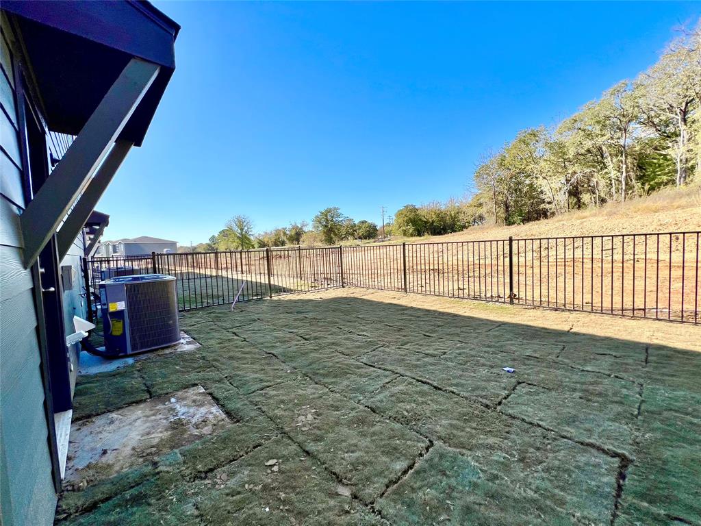 3501 East Renfro Street, Unit 106 Burleson, TX 76028 - Photo 4 of 32 a view of outdoor space and deck