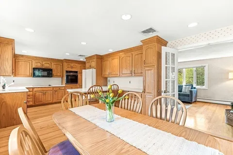 a bedroom with furniture and a table