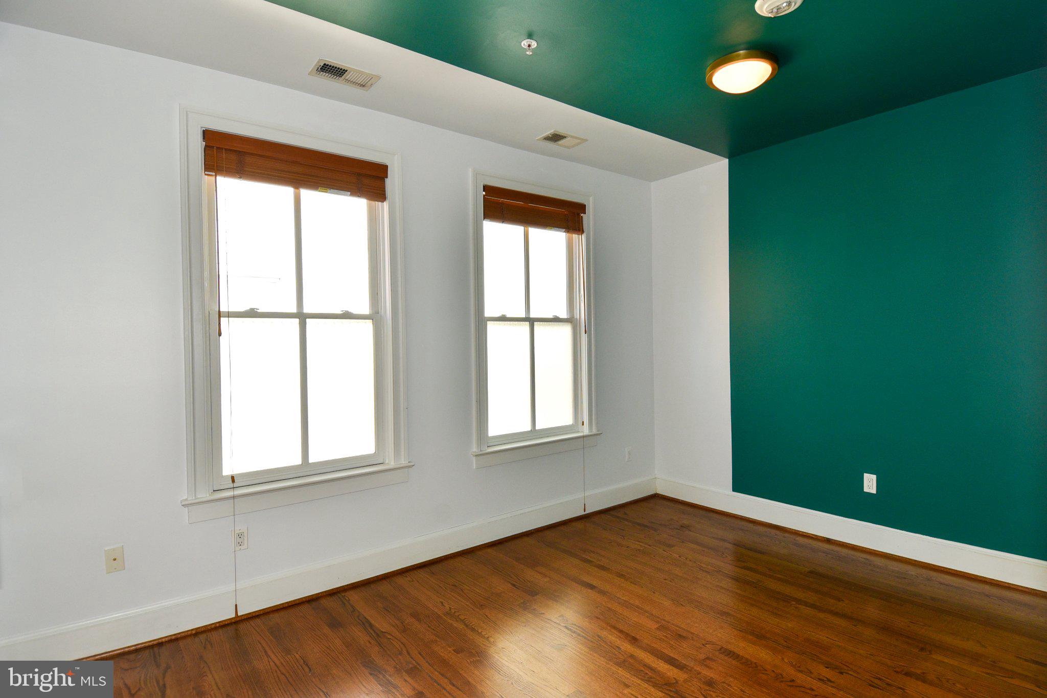 1316 9th Street Northwest Washington, DC 20001 - Photo 15 of 44 Bright room with bold teal accents.