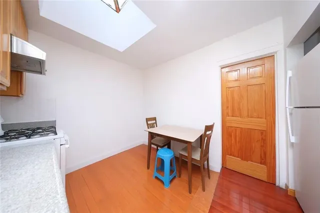 a workspace with furniture and wooden floor