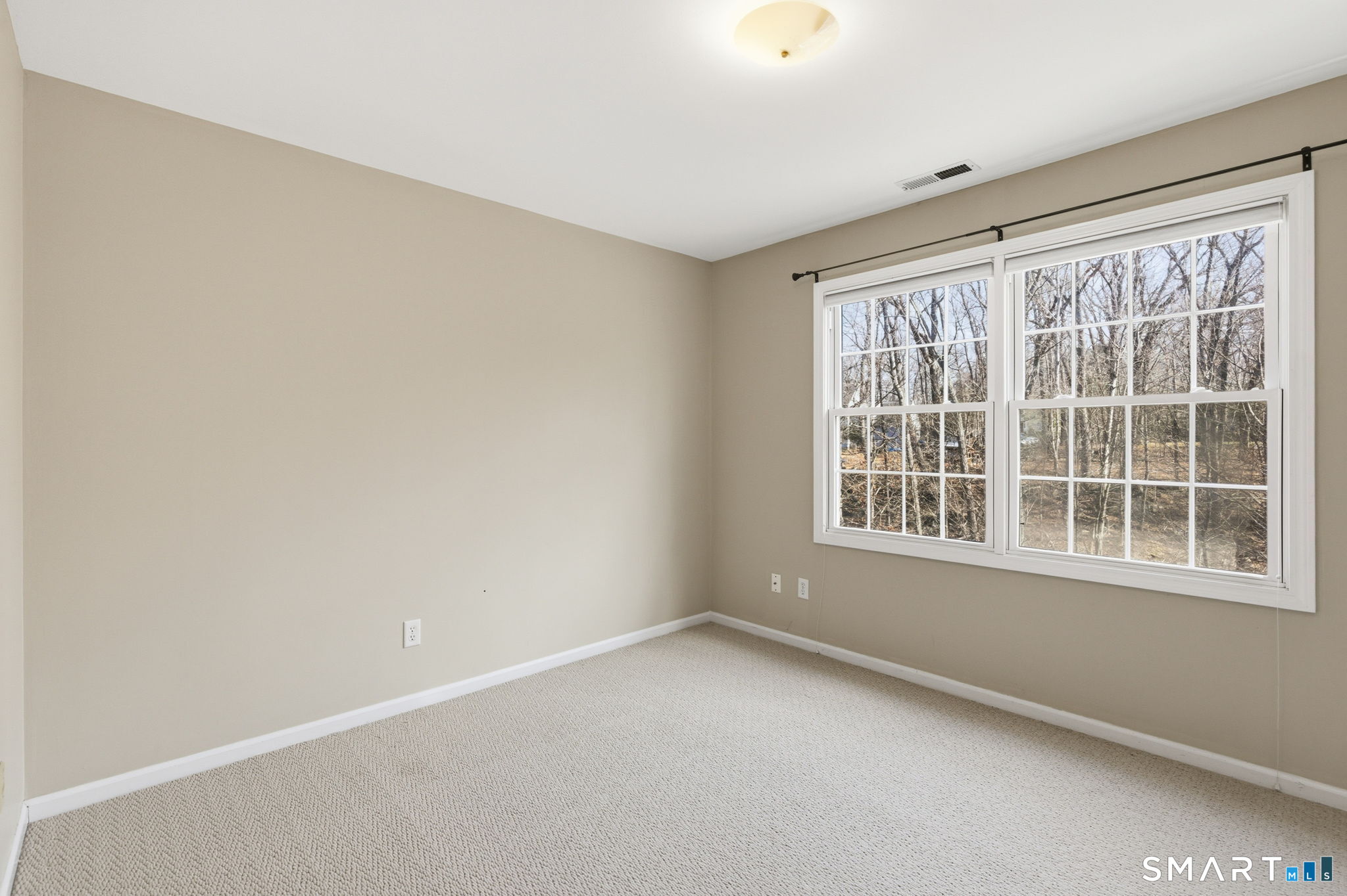 22 Misty Vale Road Newtown, CT 06482 - Photo 16 of 30 an empty room with a window