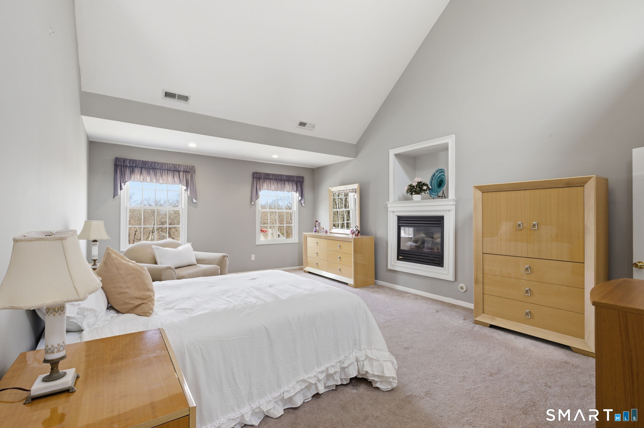22 Misty Vale Road Newtown, CT 06482 - Photo 19 of 30 a bedroom with a large bed and a couch