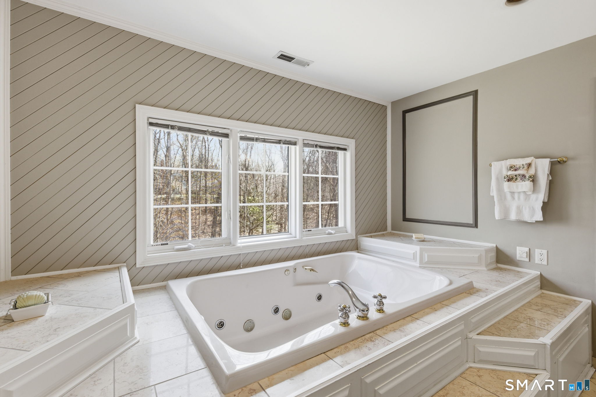 22 Misty Vale Road Newtown, CT 06482 - Photo 21 of 30 a bathroom with a tub a sink and a window