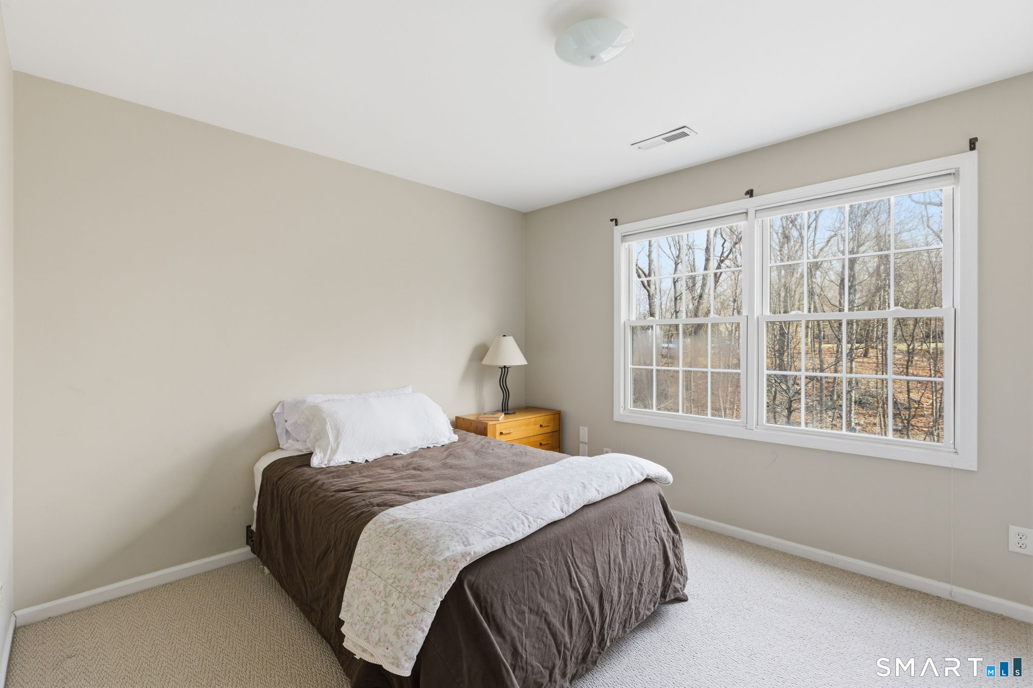 22 Misty Vale Road Newtown, CT 06482 - Photo 26 of 30 a bedroom with a bed and window
