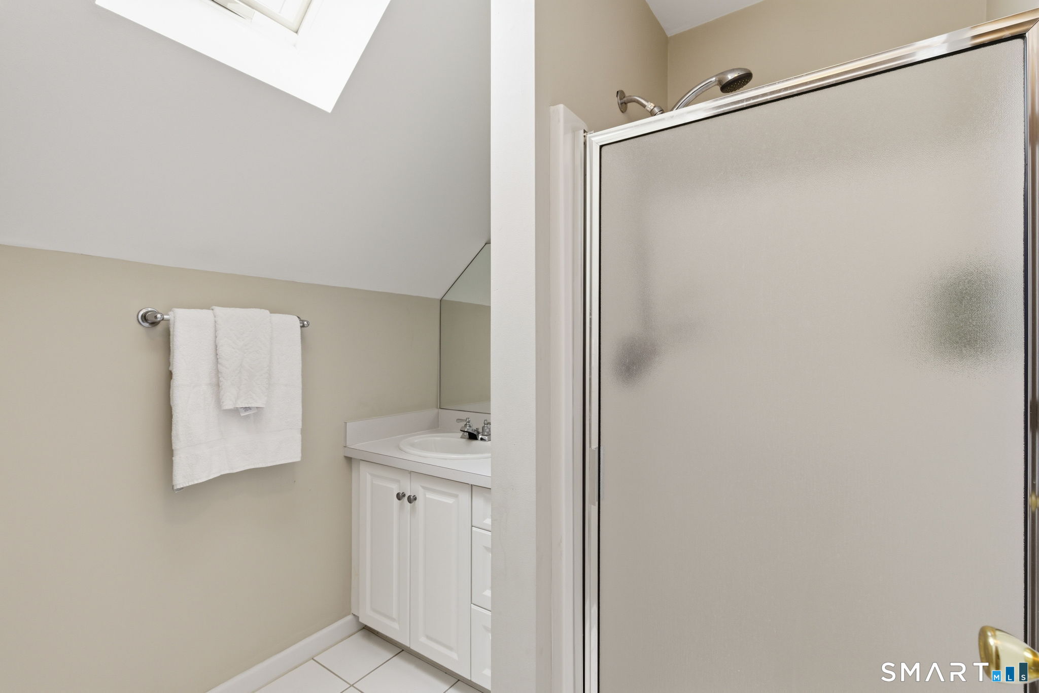 22 Misty Vale Road Newtown, CT 06482 - Photo 27 of 30 a bathroom with a shower and a sink