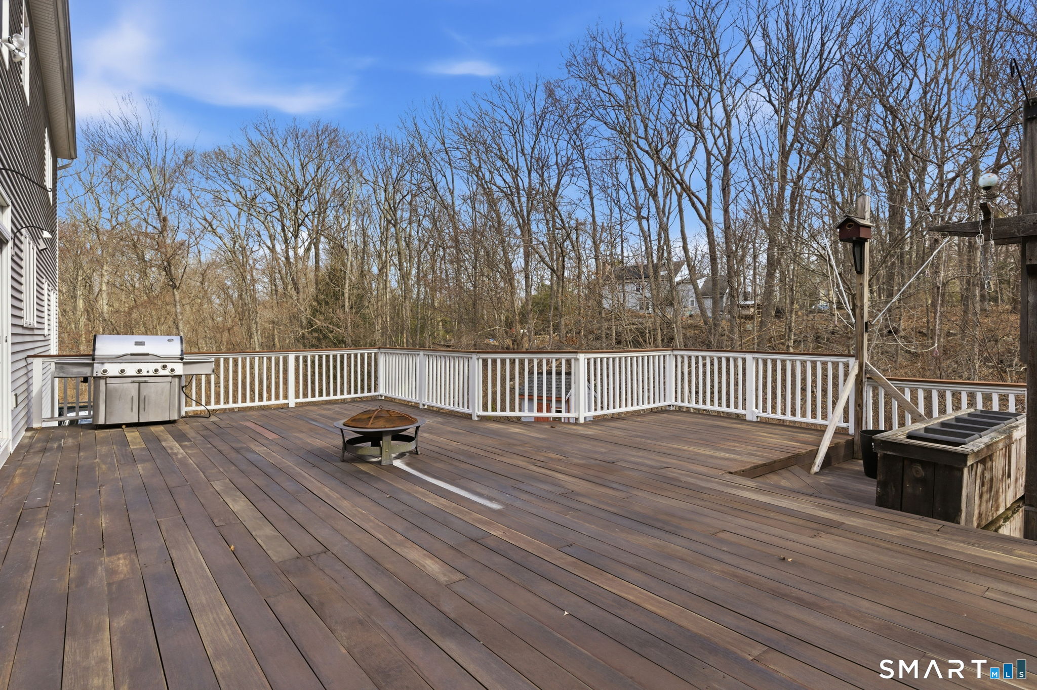 22 Misty Vale Road Newtown, CT 06482 - Photo 30 of 30 a view of a roof deck with wooden floor and fence