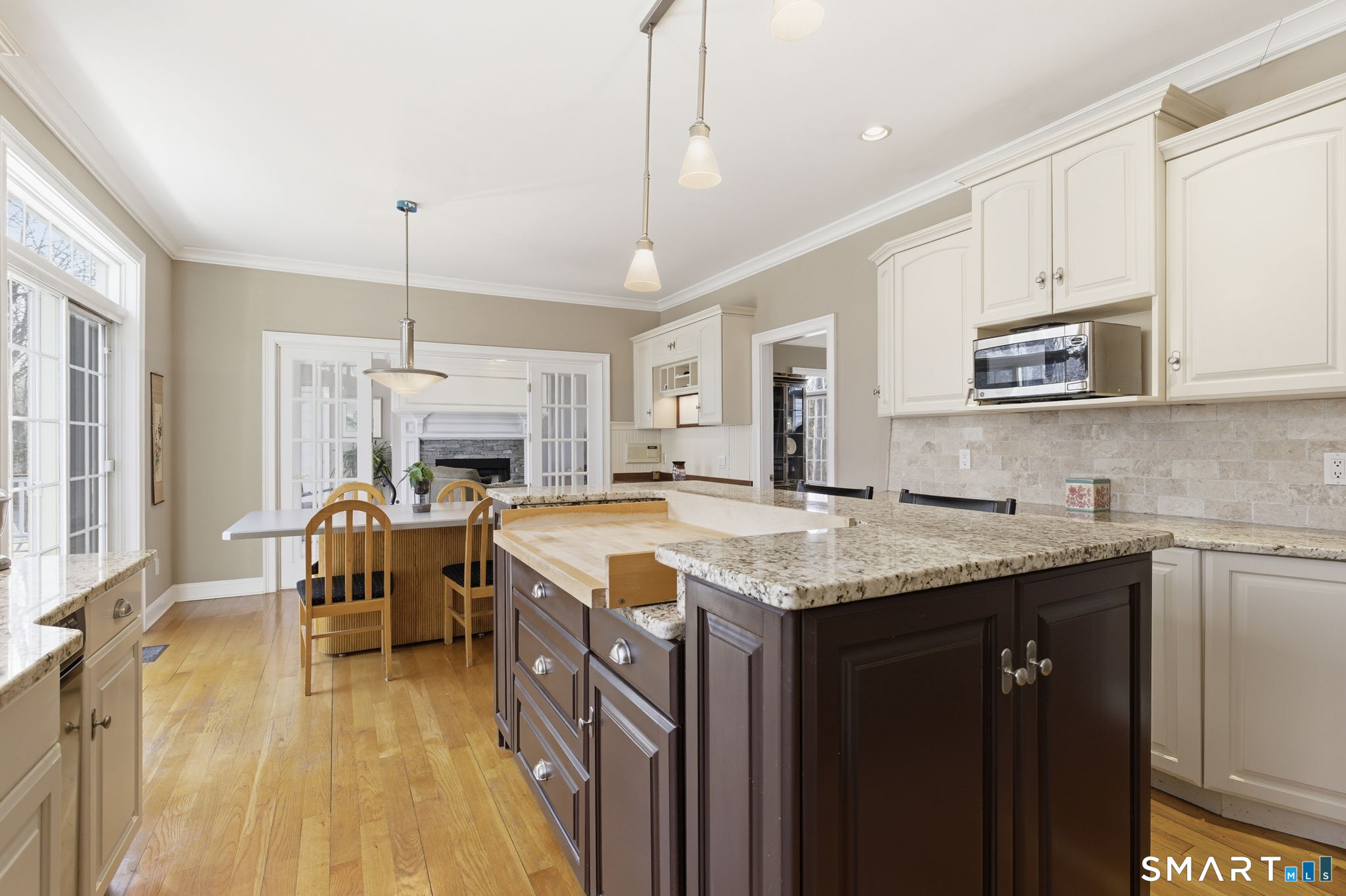 22 Misty Vale Road Newtown, CT 06482 - Photo 4 of 30 a open kitchen with stainless steel appliances granite countertop a sink stove and refrigerator