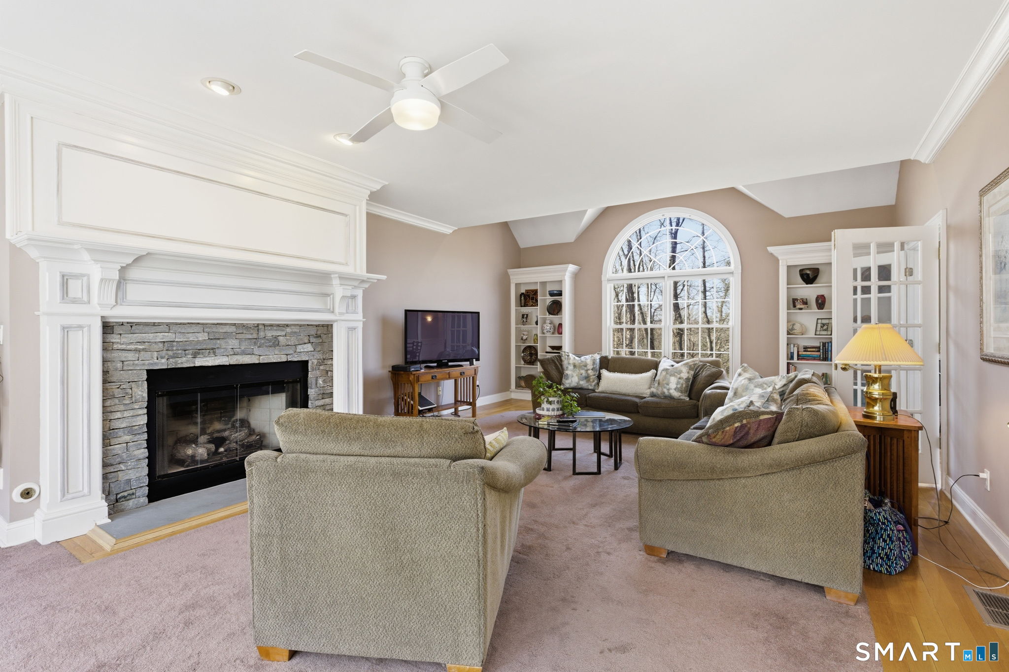 22 Misty Vale Road Newtown, CT 06482 - Photo 6 of 30 a living room with furniture and a fireplace