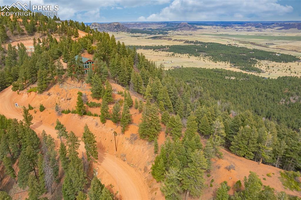 13464 Deer Ridge Way Larkspur, CO 80118 - Photo 11 of 15 a view of an ocean and a mountain