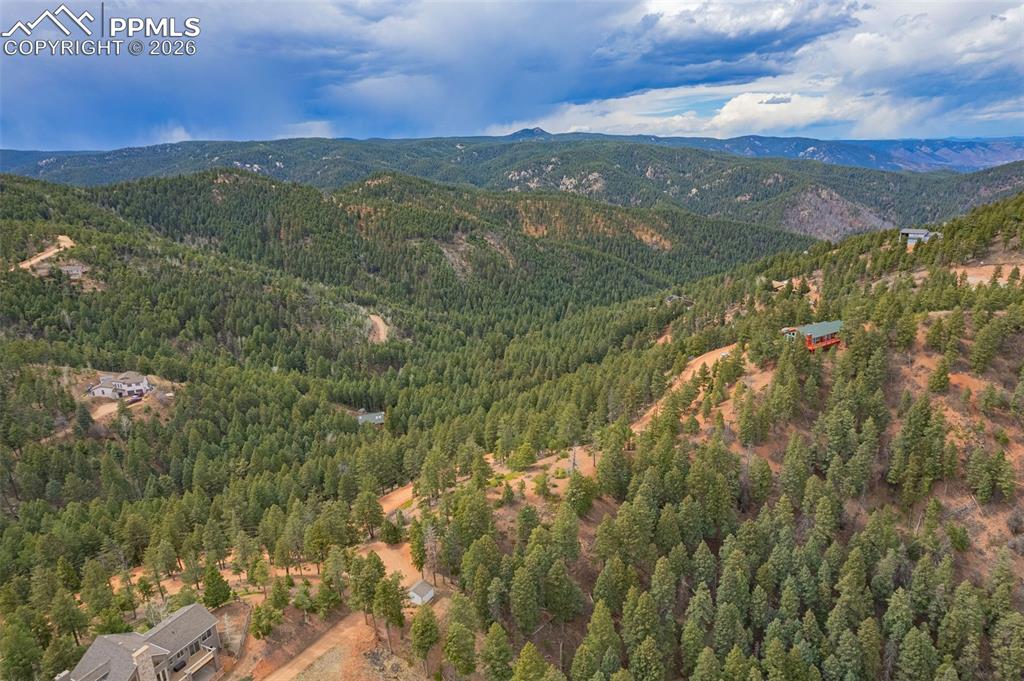 13464 Deer Ridge Way Larkspur, CO 80118 - Photo 4 of 15 a view of city and mountain