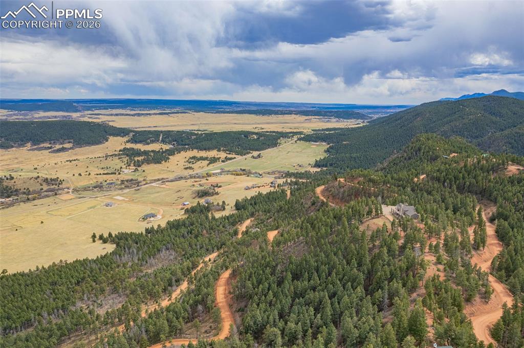 13464 Deer Ridge Way Larkspur, CO 80118 - Photo 8 of 15 a view of an ocean and beach