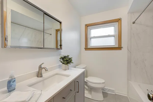 $419,000 | 7636 West Rosedale Avenue, Chicago, IL 60631