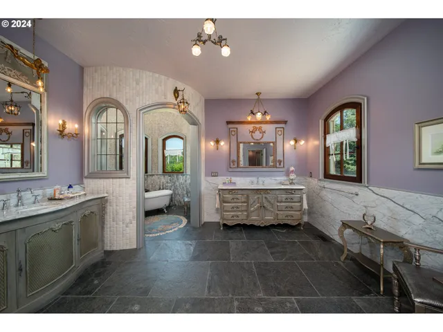 a view of a livingroom with furniture window and wooden floor