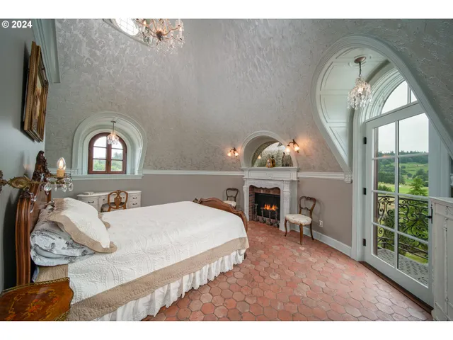 a lobby with furniture and a window