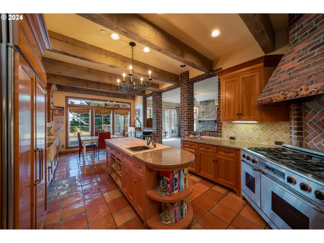 a bedroom with a large bed and a large window