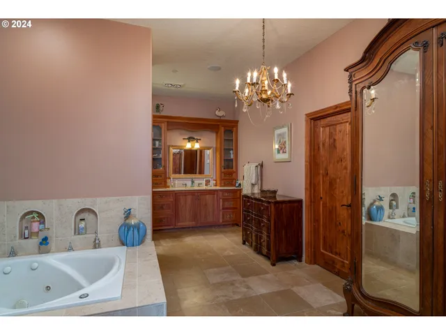 a living room with furniture a window and gym equipment