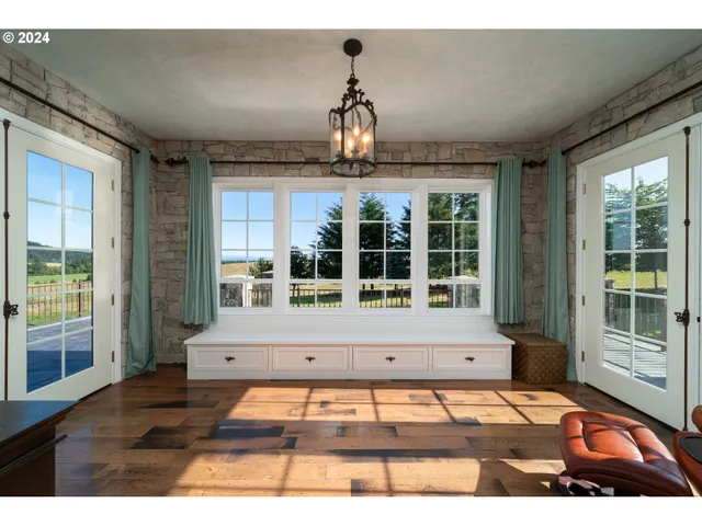 a view of a patio with table and chairs