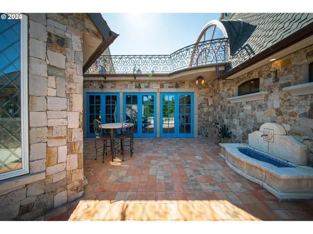 a view of a swimming pool with a lounge chair